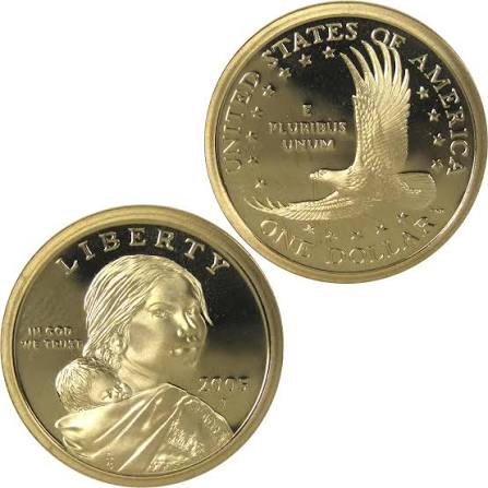 Grading strip showing four 2005 Sacagawea dollars from worn circulated condition to gem uncirculated MS66 quality